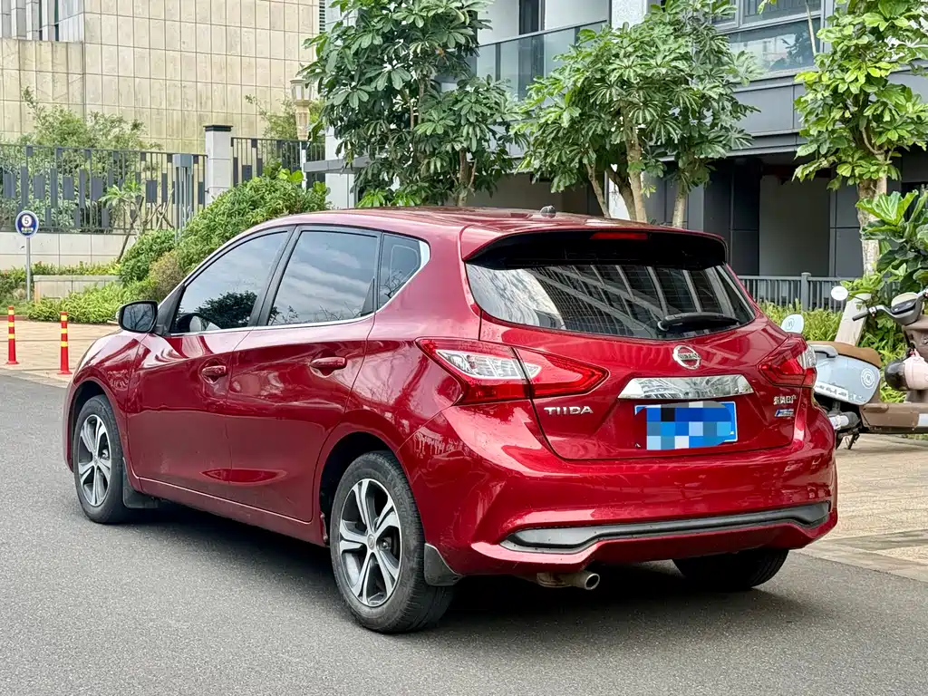Nissan Tiida — фото 9