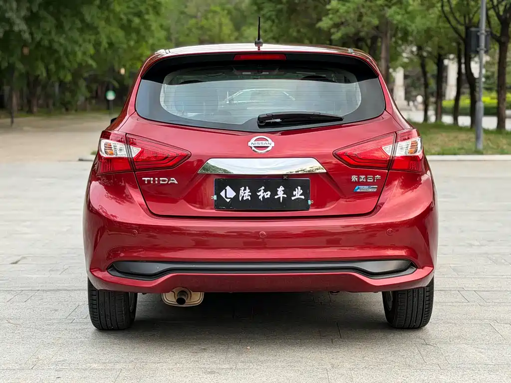 Nissan Tiida — фото 17