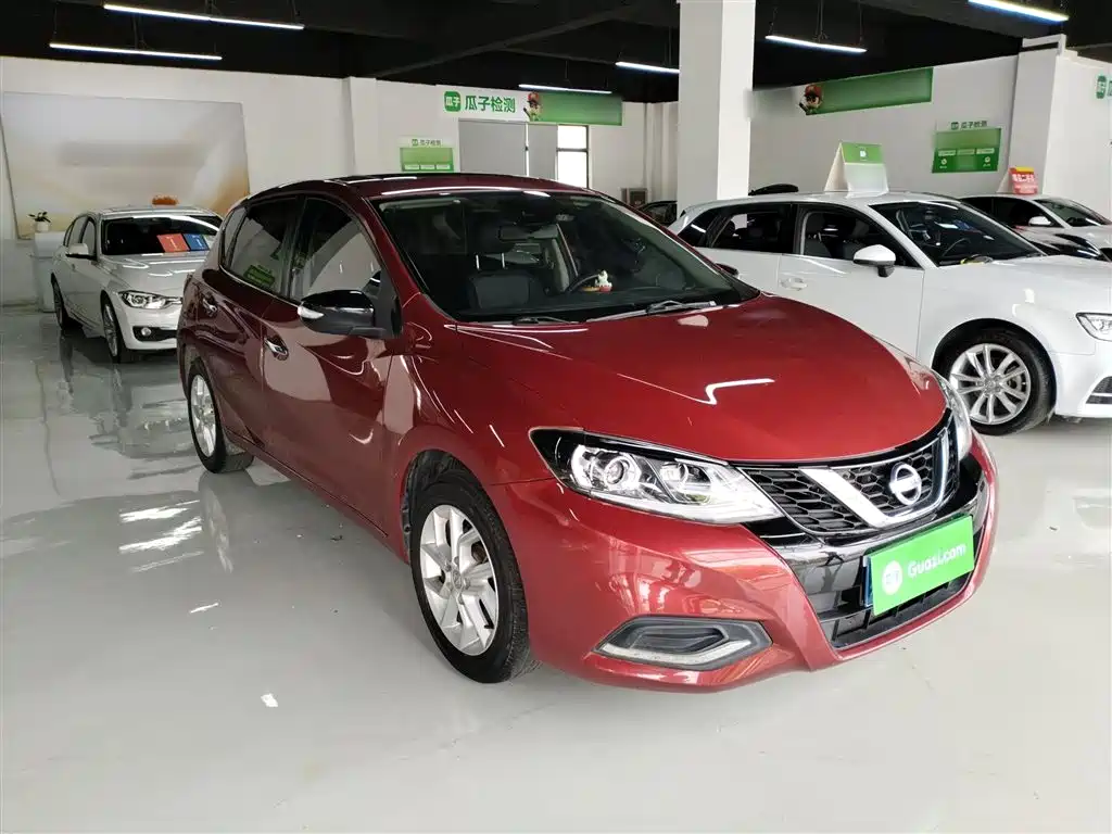 Nissan Tiida — фото 4