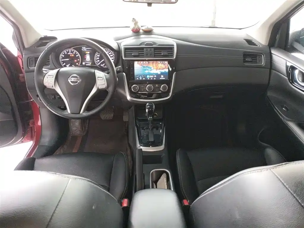 Nissan Tiida — фото 10
