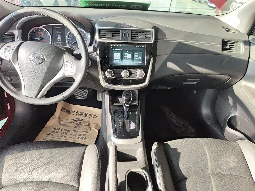 Nissan Tiida — фото 13