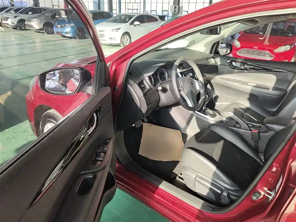 Nissan Tiida — фото 16