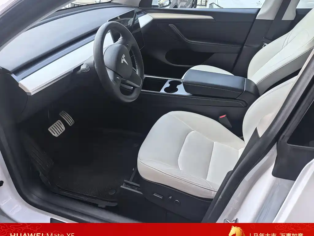 Tesla Model Y — фото 11