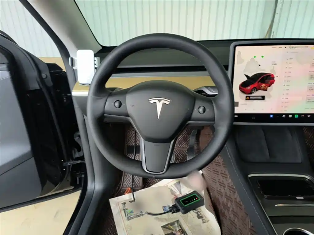 Tesla Model Y — фото 11
