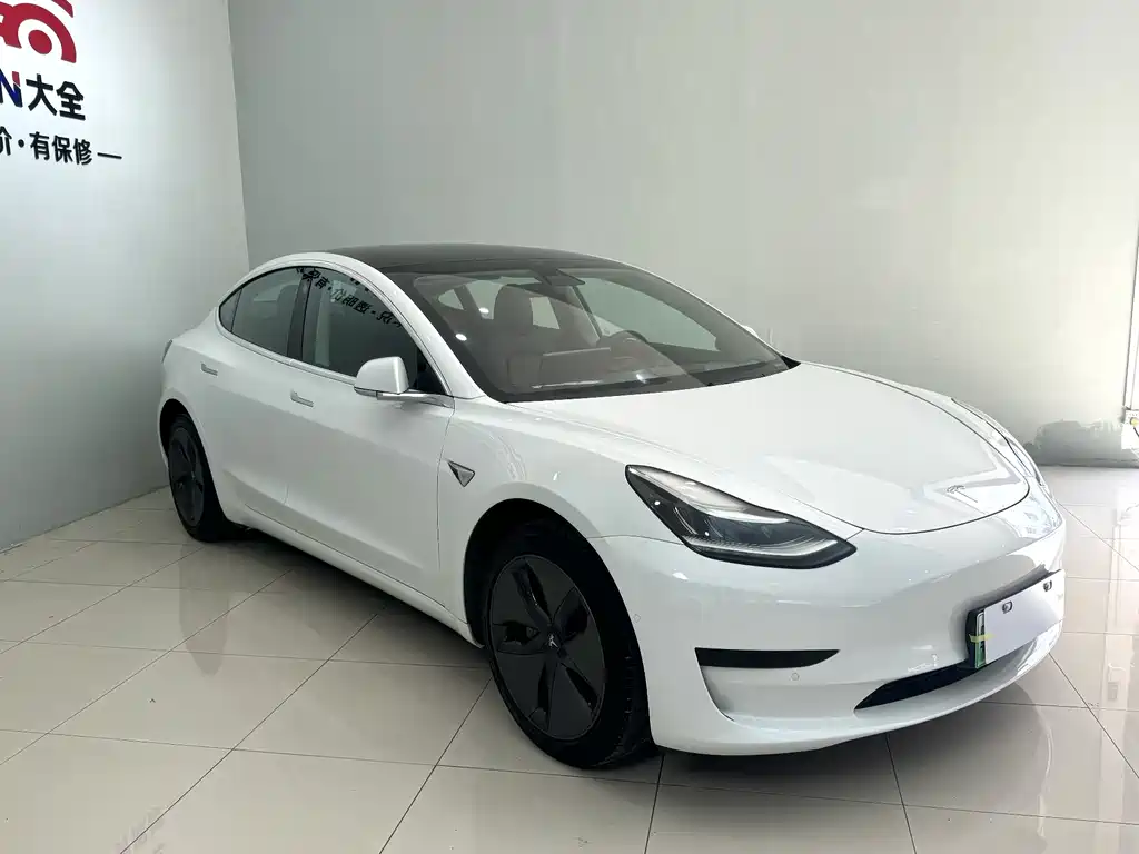 Tesla Model 3 — фото 7