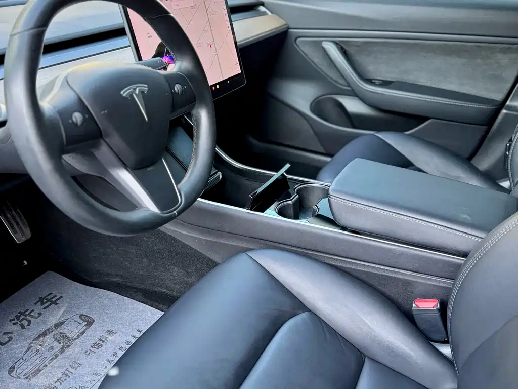 Tesla Model 3 — фото 7