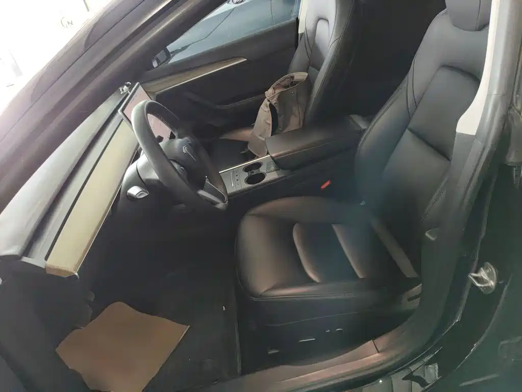 Tesla Model 3 — фото 11
