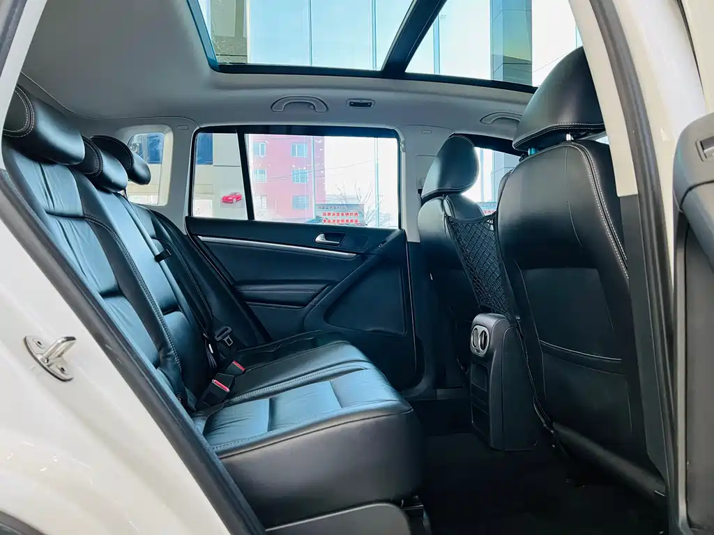 Volkswagen Tiguan — фото 9