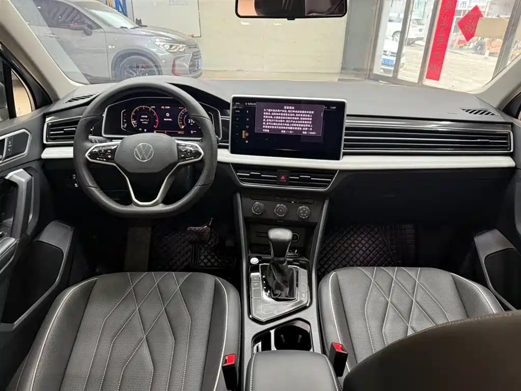Volkswagen Tiguan L — фото 14
