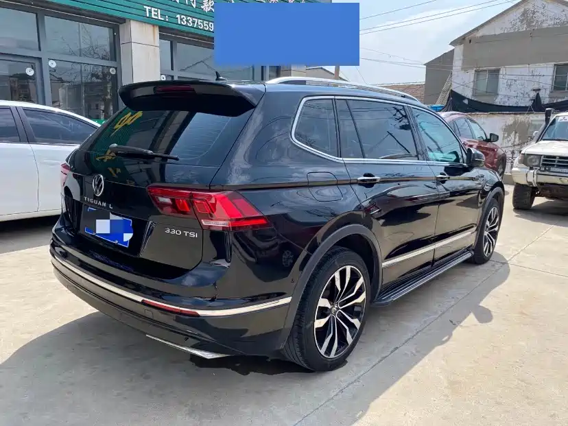 Volkswagen Tiguan L — фото 2