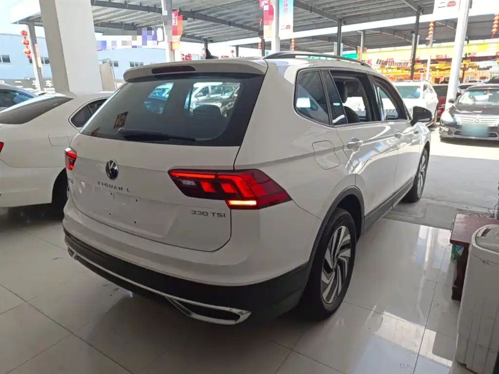Volkswagen Tiguan L — фото 5