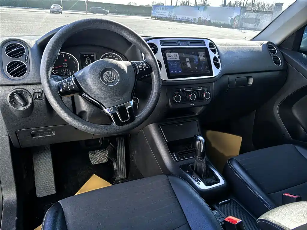 Volkswagen Tiguan — фото 11
