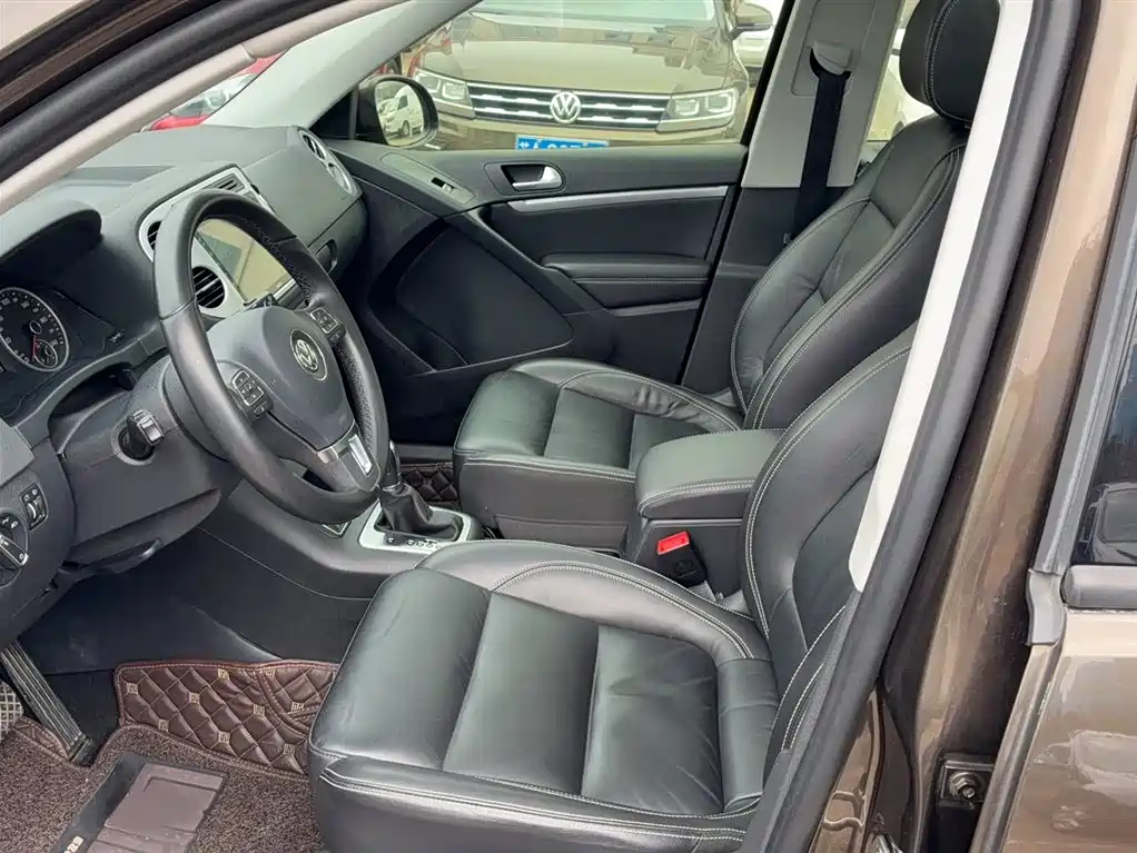 Volkswagen Tiguan — фото 11