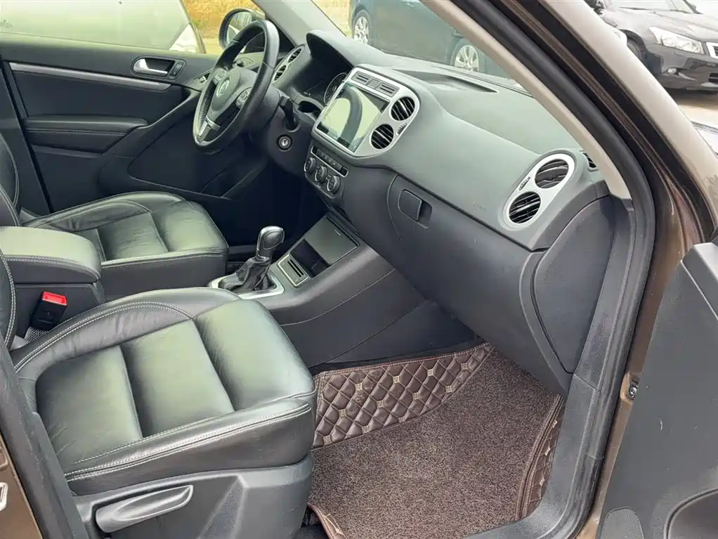 Volkswagen Tiguan — фото 17