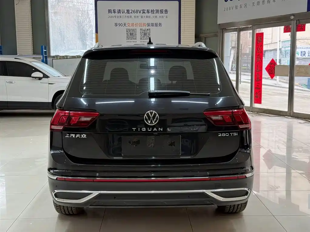 Volkswagen Tiguan L — фото 5