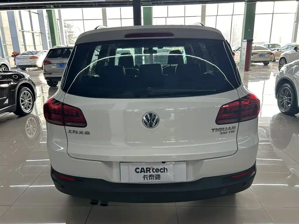 Volkswagen Tiguan — фото 6