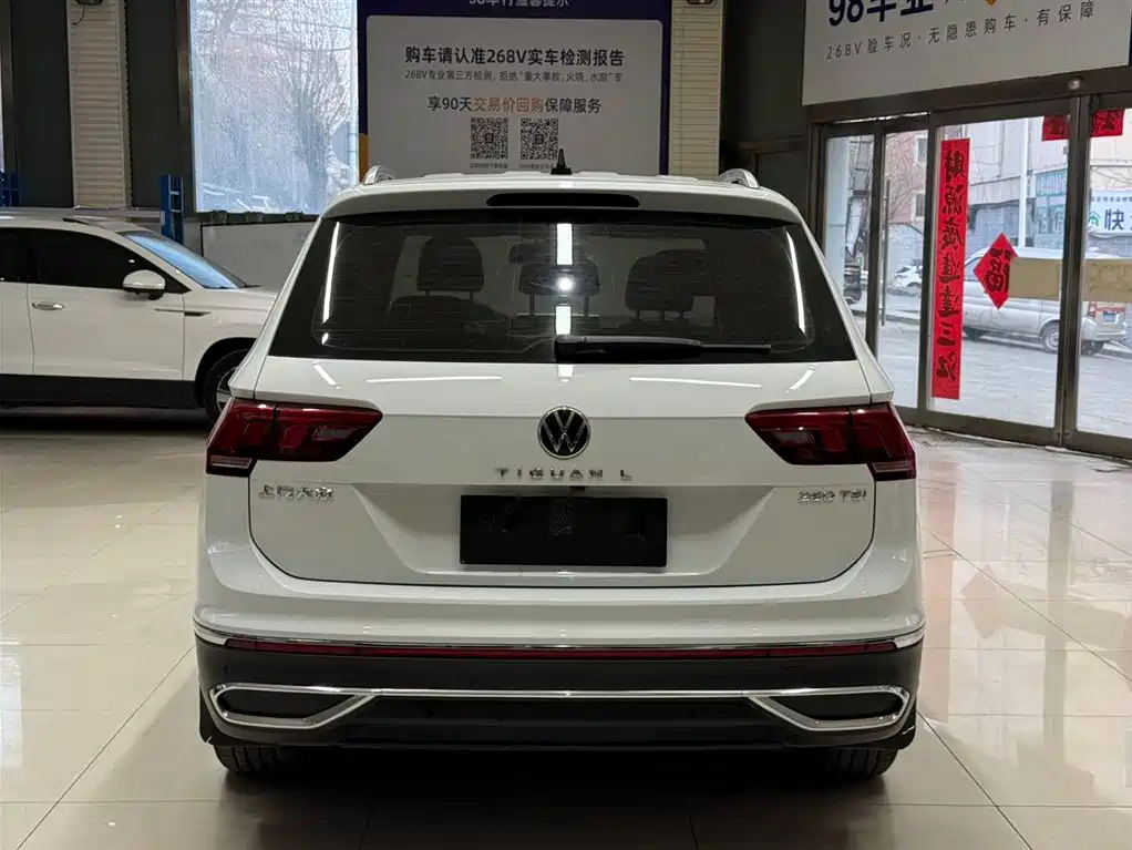 Volkswagen Tiguan L — фото 5