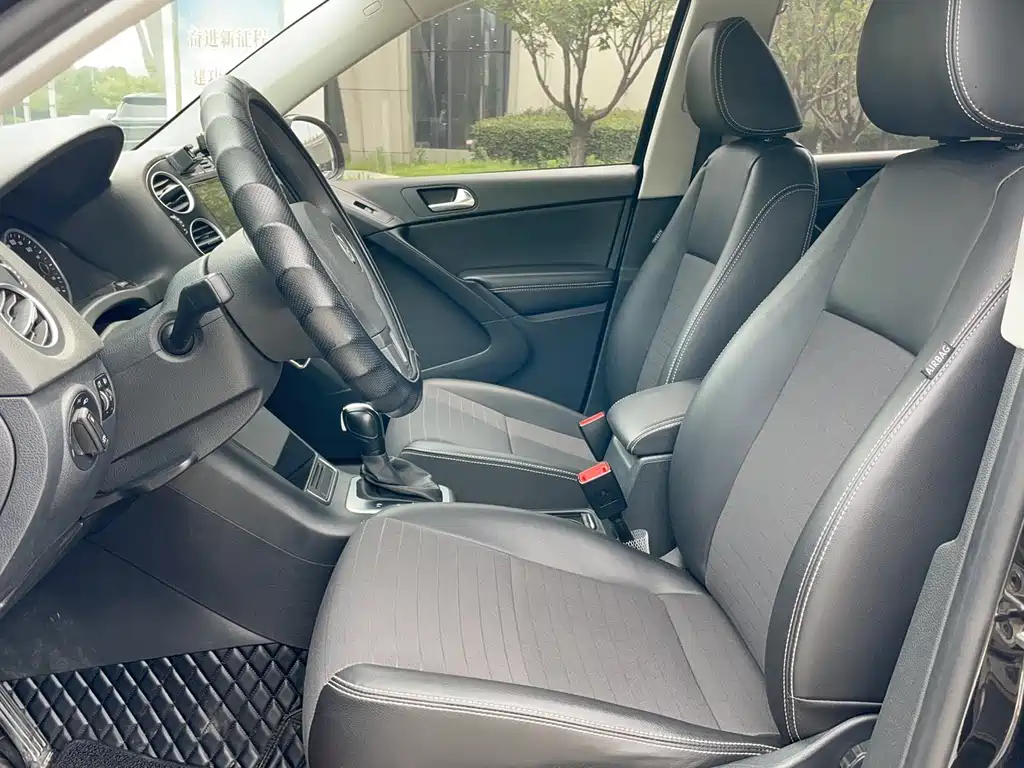 Volkswagen Tiguan — фото 9