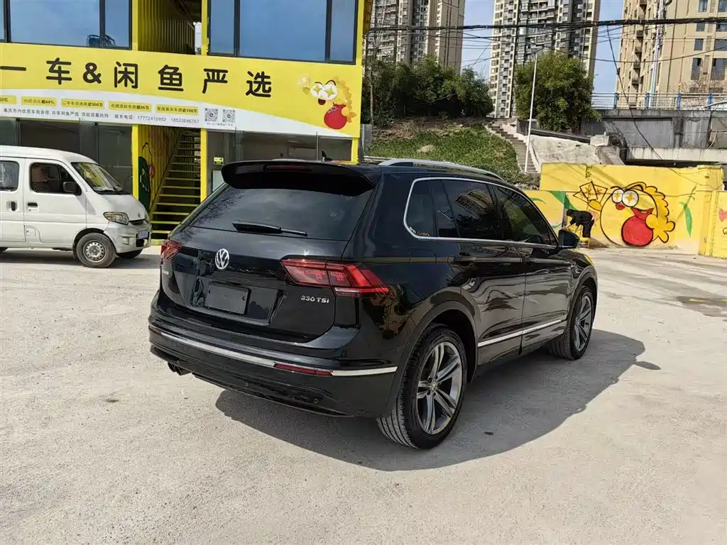 Volkswagen Tiguan — фото 7