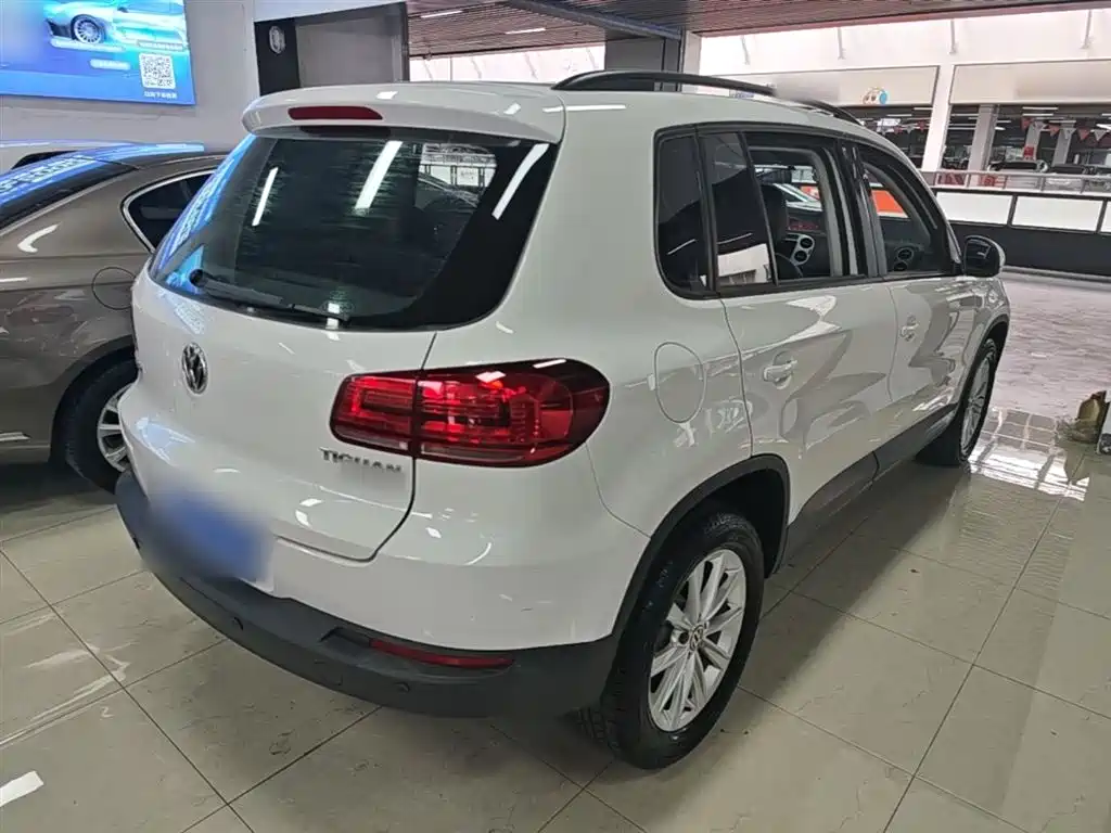 Volkswagen Tiguan — фото 7