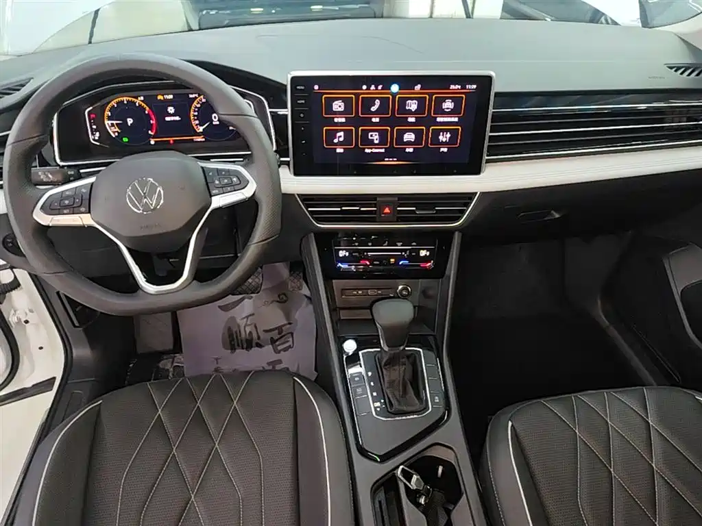Volkswagen Tiguan L — фото 14