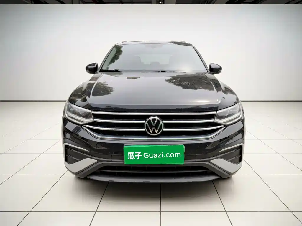 Volkswagen Tiguan L — фото 24