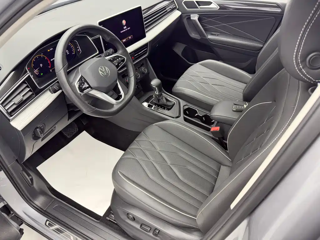 Volkswagen Tiguan L — фото 11