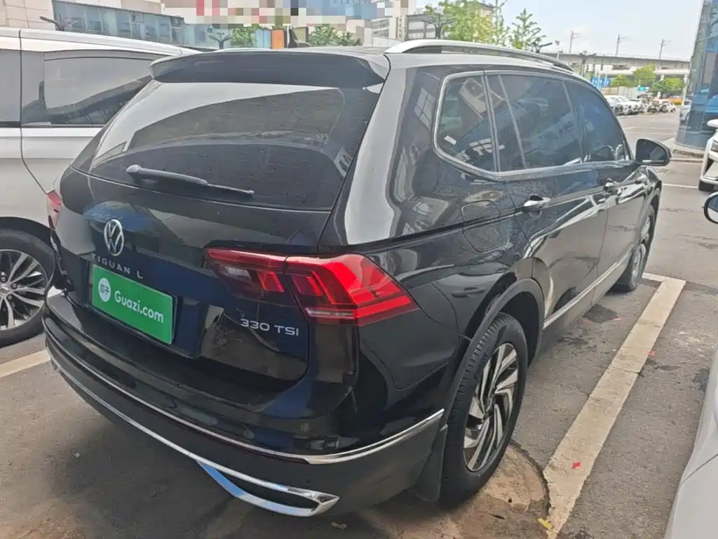 Volkswagen Tiguan L — фото 7