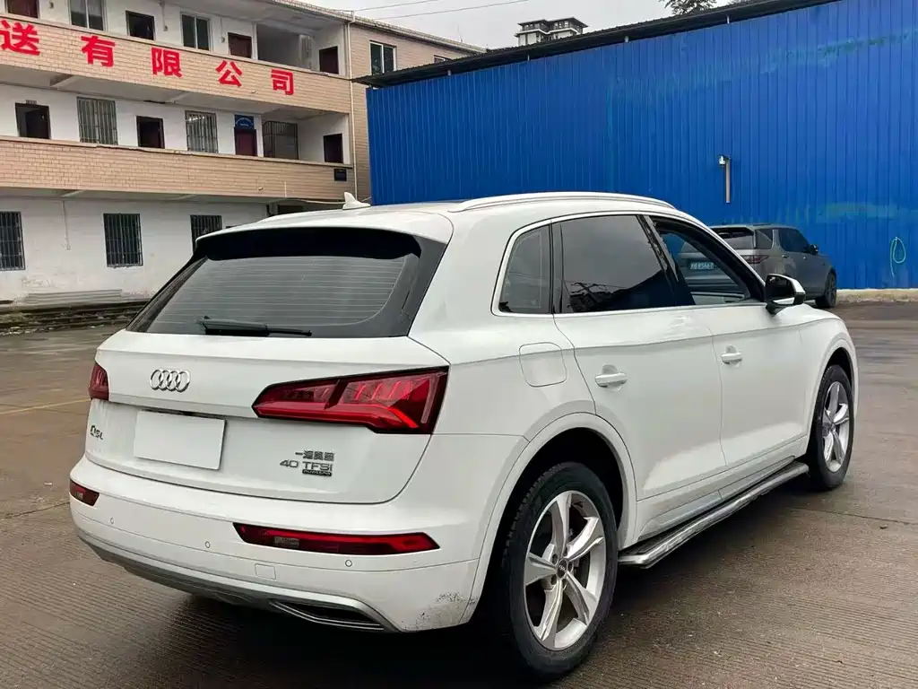 Audi Q5L — фото 5