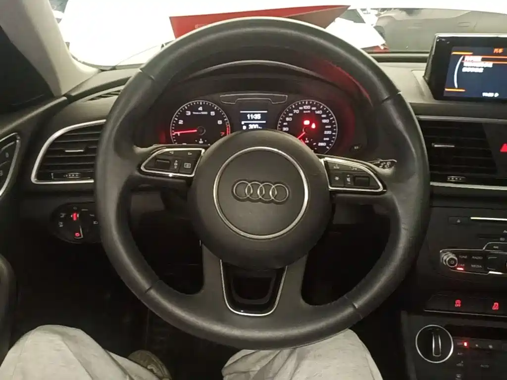 Audi Q3 — фото 11