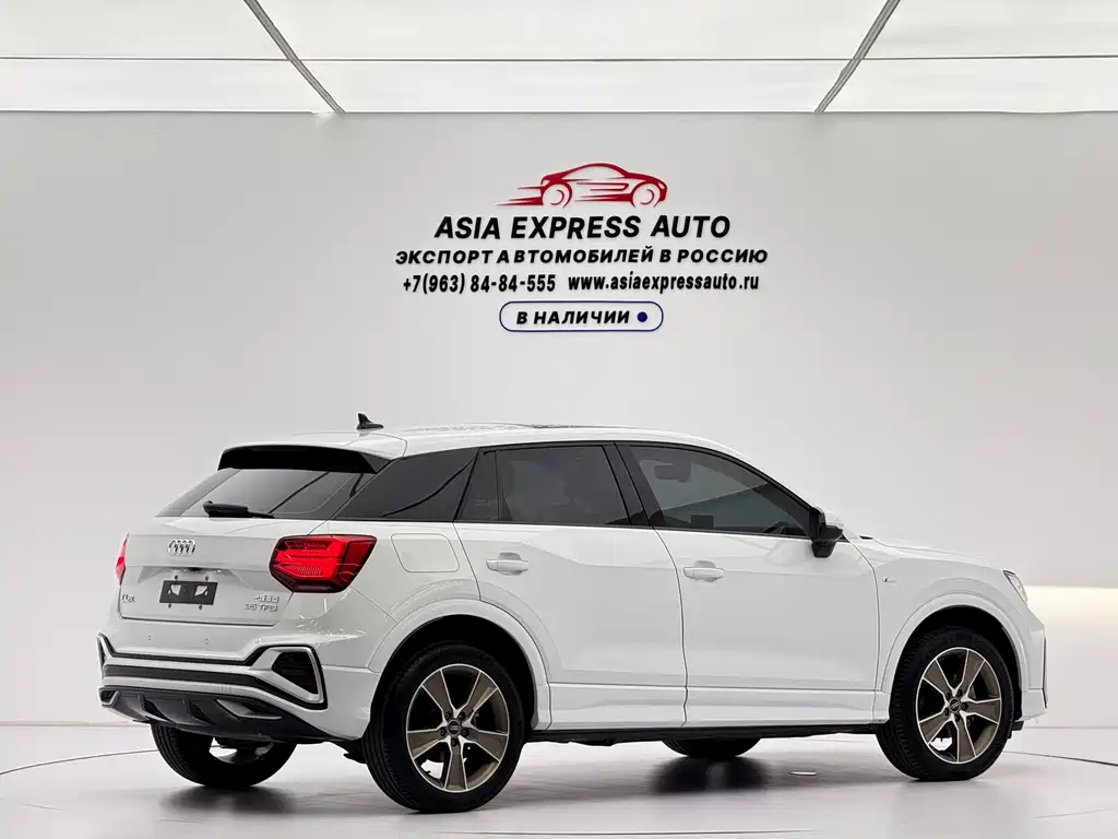 Audi Q2L — фото 4