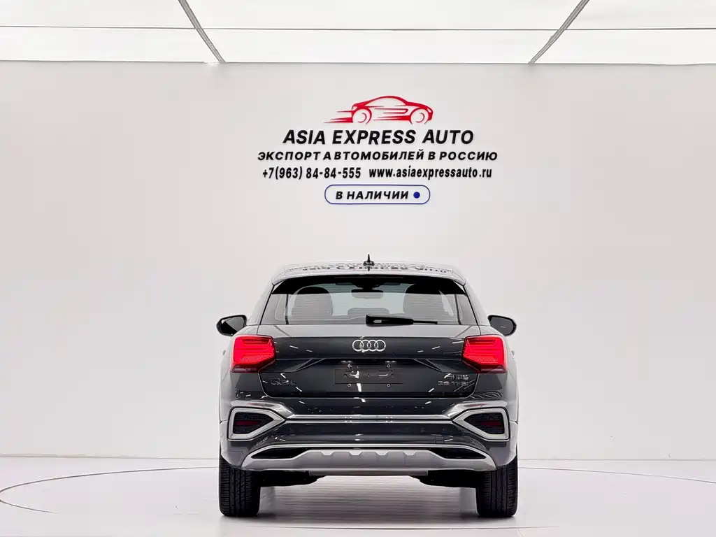 Audi Q2L — фото 5