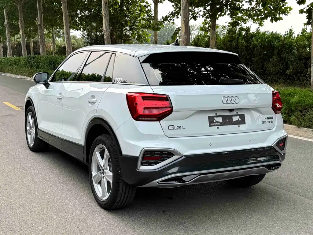 Audi Q2L — фото 6