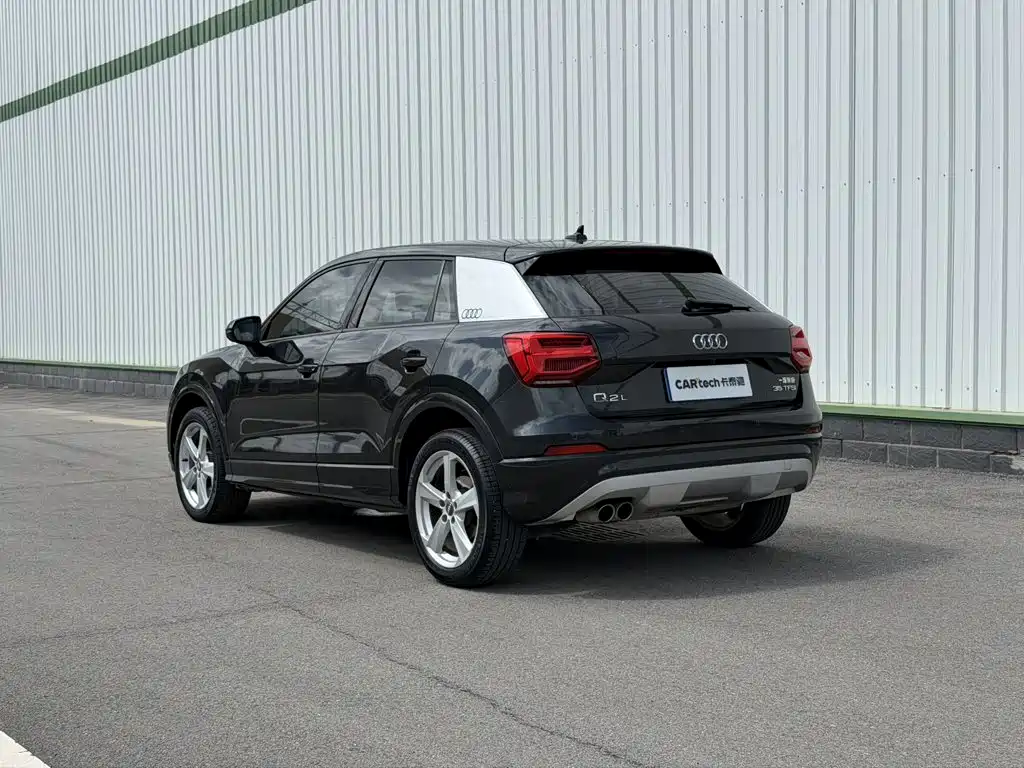 Audi Q2L — фото 7