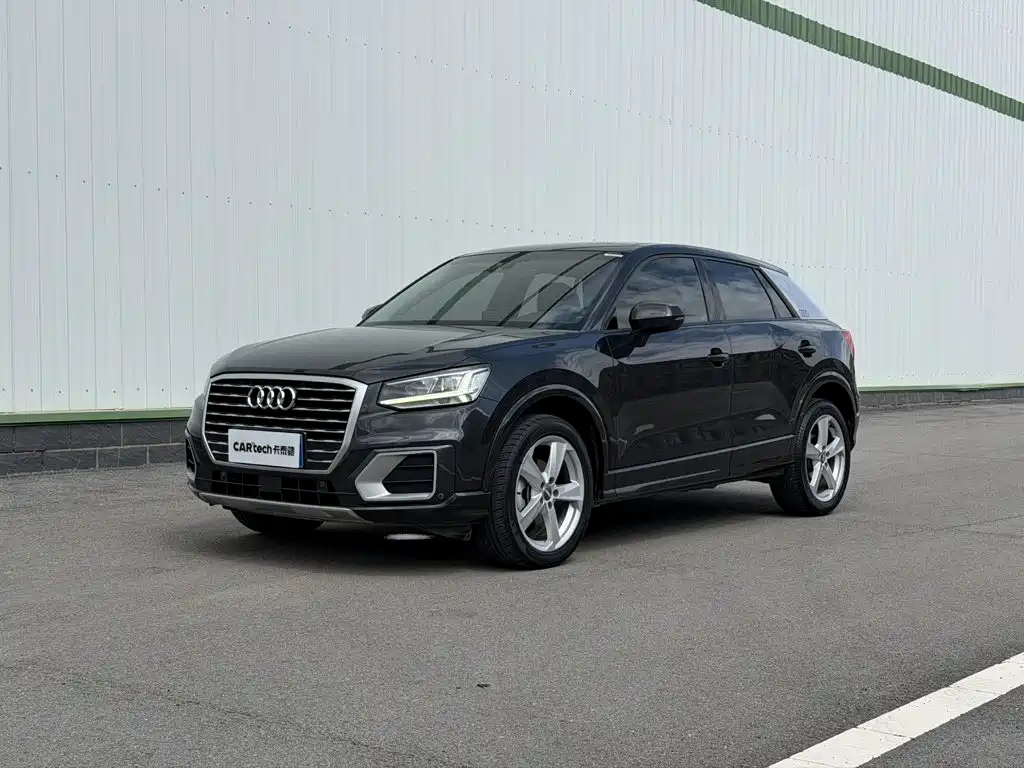 Audi Q2L — фото 10