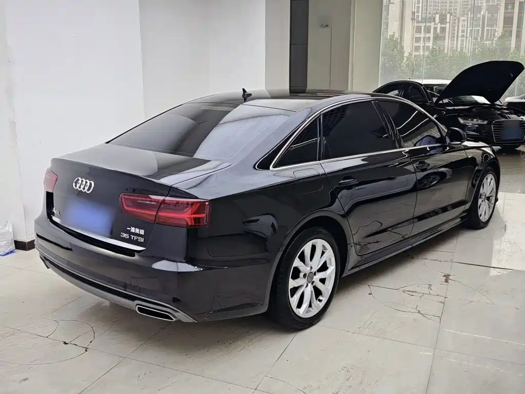 Audi A6L — фото 8