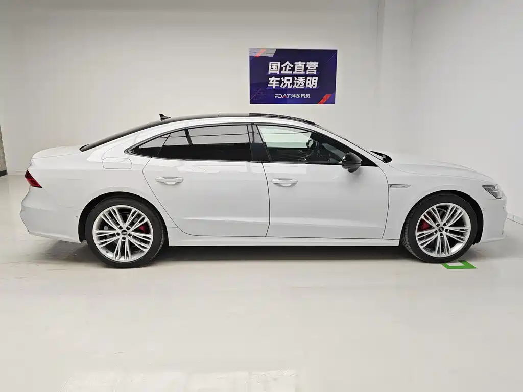 Audi A7L — фото 7
