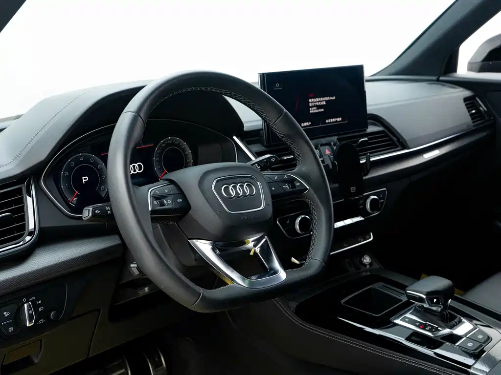 Audi Q5L — фото 5