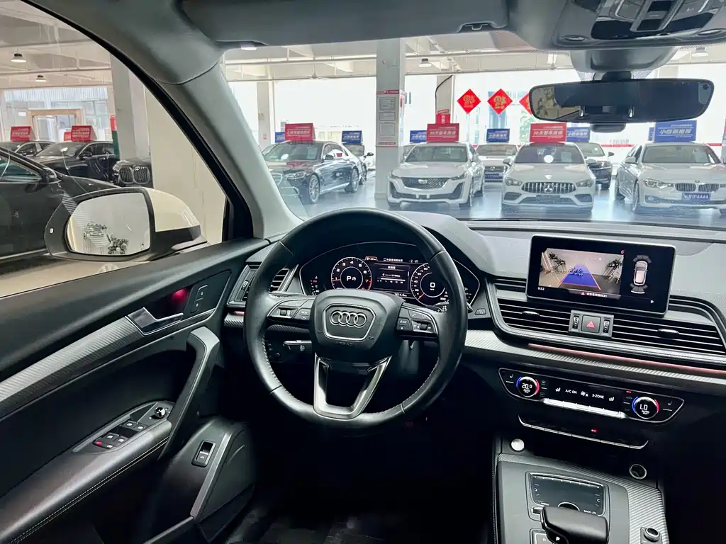 Audi Q5L — фото 9