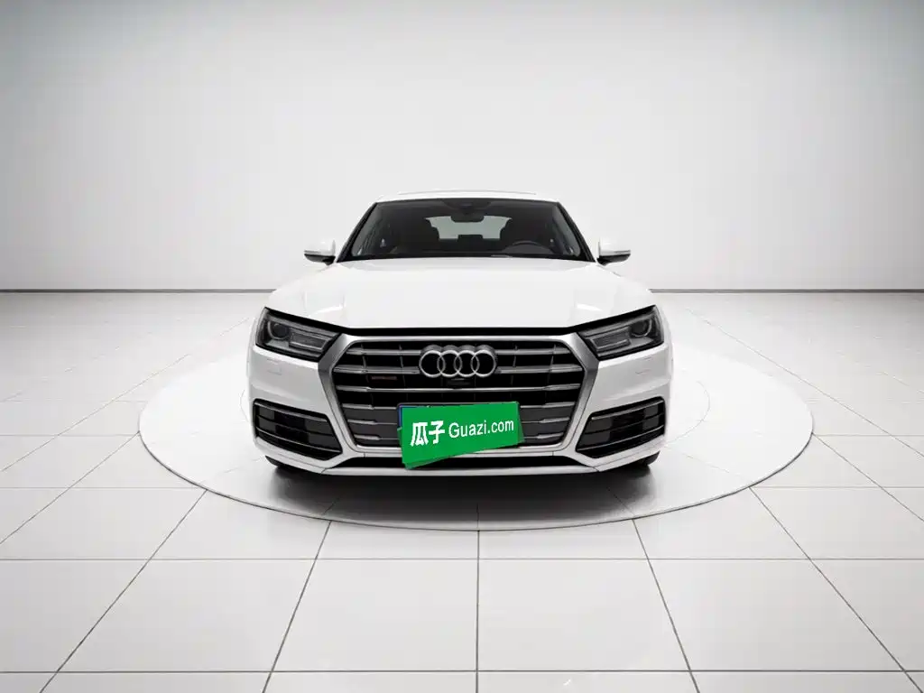 Audi Q5L — фото 9