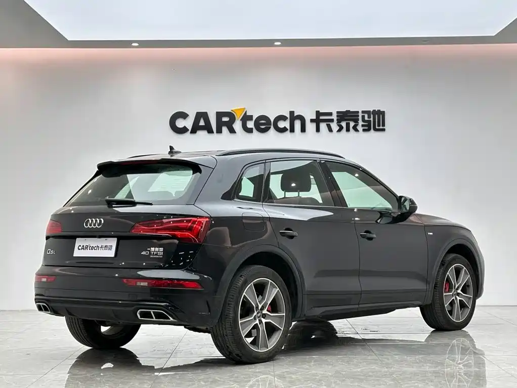 Audi Q5L — фото 5