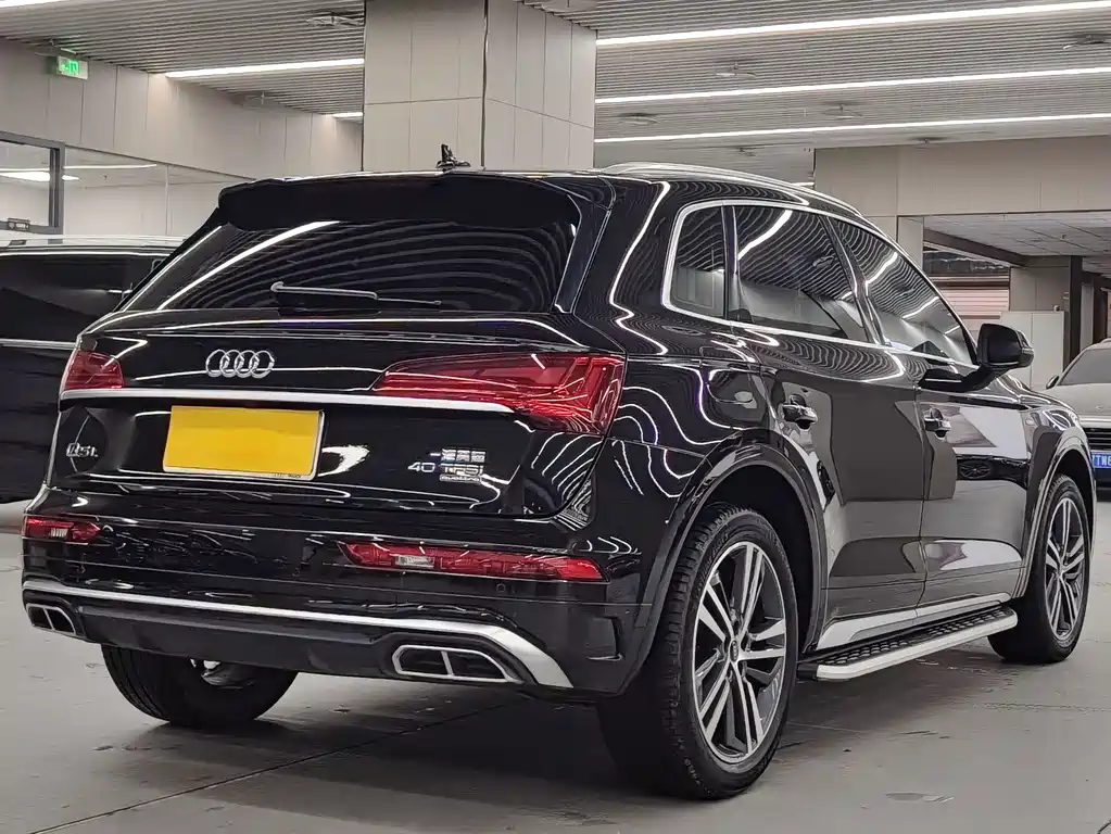 Audi Q5L — фото 10