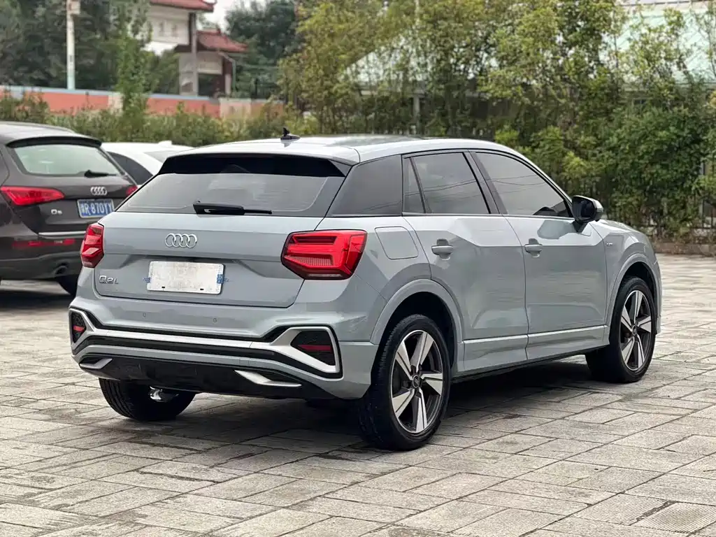 Audi Q2L — фото 10