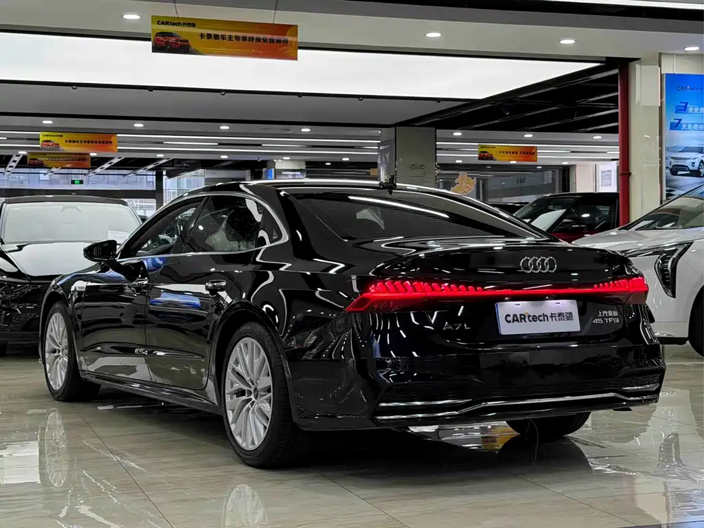 Audi A7L — фото 7