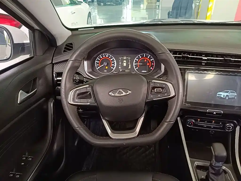 Chery Tiggo 3x — фото 11