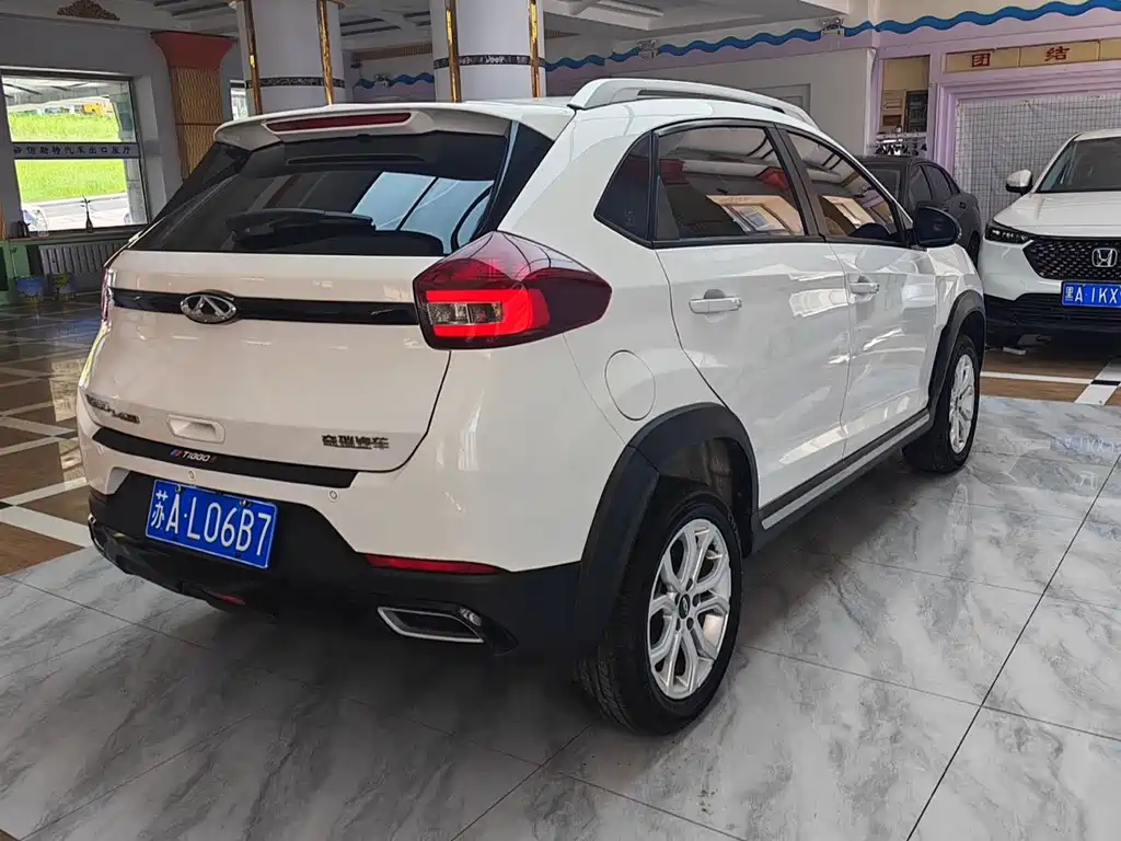 Chery Tiggo 3x — фото 8