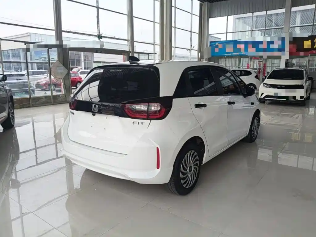 Honda Fit — фото 7