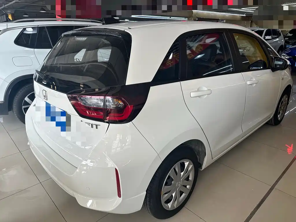 Honda Fit — фото 11