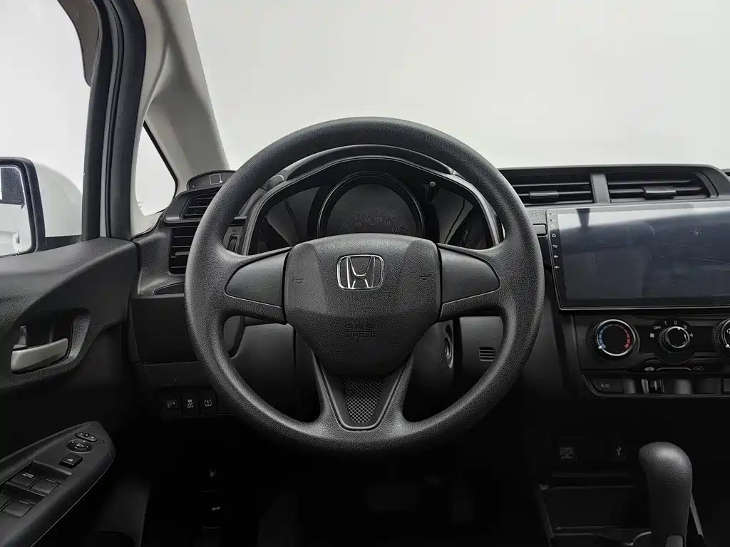 Honda Fit — фото 11