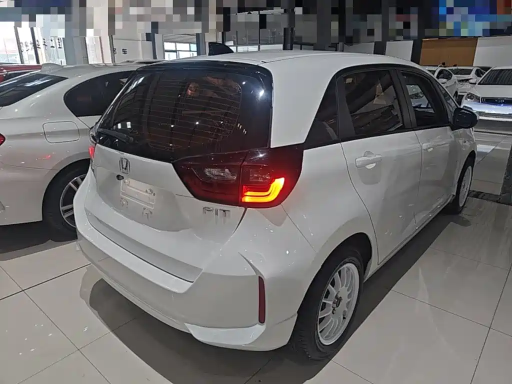 Honda Fit — фото 7